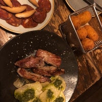 Photo taken at Lobos Meat and Tapas by Priscila D. on 5/27/2019