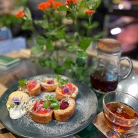 Photo taken at Aoyama Flower Market Tea House by activity c. on 11/11/2021