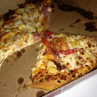 Photo taken at Domino&amp;#39;s Pizza by Tanyaporn V. on 2/4/2013