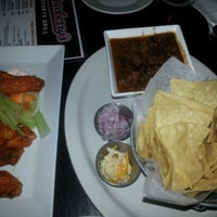 Photo taken at Strawberry&amp;#39;s Sports Grill by Mizy K. on 9/23/2012