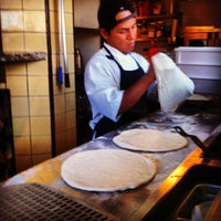 Photo taken at Olio Wood Fired Pizzeria by Mani B. on 9/23/2012