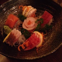 Photo taken at Yuzu Café &amp; Cuisine by Riane on 5/28/2014