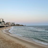 Photo taken at Praia da Barra by Cristian M. on 10/20/2021