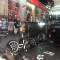 Photo taken at Planet Motorcycle Service Centre by Equilibirum K. on 3/7/2014