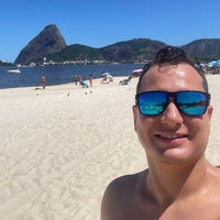 Photo taken at Praia do Flamengo by Lucas C. on 1/2/2023