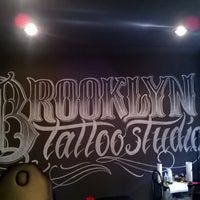 Photo taken at Brooklyn Tattoo and Barber Studio by Саня С. on 6/5/2015