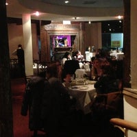 Photo taken at Saffron Indian Cuisine by Christian B. on 1/13/2013