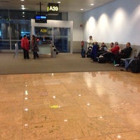 Photo taken at Gate A39 by Stephan L. on 10/16/2012