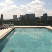 Photo taken at Water Street Rooftop Pool by Christina T. on 4/13/2013