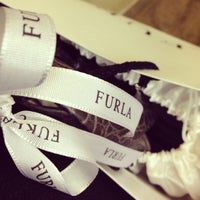 Photo taken at Furla by Daria P. on 1/31/2013