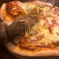 Photo taken at Koh Lanta Pizzeria by Ratcha P. on 8/12/2019