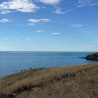 Photo taken at Godley Head Scenic Reserve by Cate H. on 4/28/2013