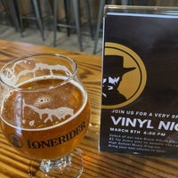 Photo taken at Lonerider Brewing Company by Bryan R. on 3/31/2022