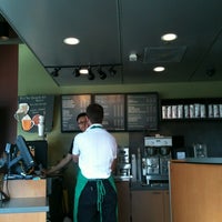 Photo taken at Starbucks by Haruka T. on 10/1/2012