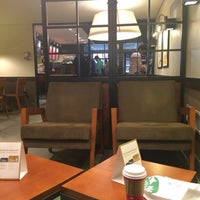 Photo taken at Starbucks by solange s. on 11/28/2014