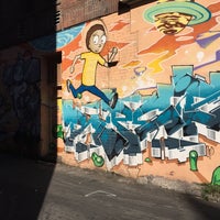 Photo taken at Rick and Morty Mural by JK K. on 7/25/2015