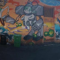 Photo taken at Rick and Morty Mural by JK K. on 7/25/2015