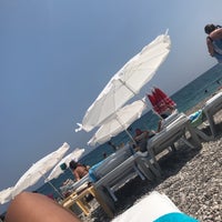 Photo taken at İnan Beach by Nadya R. on 7/30/2018
