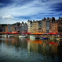 Photo taken at Port d’Honfleur by Mike S. on 8/10/2015
