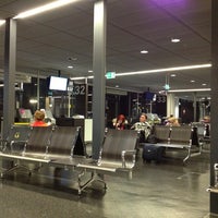 Photo taken at Gate B32 by Юрис Г. on 1/9/2013