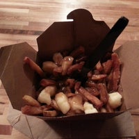 Photo taken at The Big Cheese Poutinerie by Jared G. on 5/2/2014