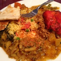 Foto diambil di Moti Mahal Indian Cuisine oleh Maria S. pada 2/9/2013