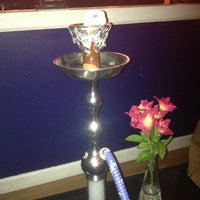 Photo taken at 7th District Hookah by Julie M. on 8/23/2013