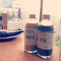 Photo taken at Roots Coffee Roaster by Anuradee R. on 7/6/2015