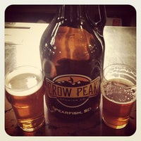 Photo taken at Crow Peak Brewing Company by Tanner V. on 4/24/2013