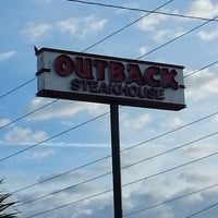 Photo taken at Outback Steakhouse by Chris B. on 12/24/2012