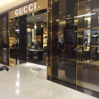 Photo taken at Gucci by Marujoh H. on 3/16/2015