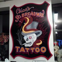 Photo taken at Chico&amp;#39;s South Broadway Tattoo Company by Brandi V. on 1/6/2012