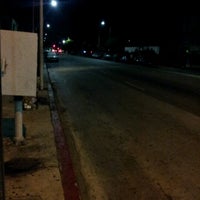 Photo taken at metro bus line 30 bus stop by Mikey R. on 10/8/2012