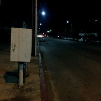 Photo taken at metro bus line 30 bus stop by Mikey R. on 10/25/2012