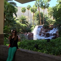 Photo taken at The Mirage Waterfall by Andy C. on 4/4/2015