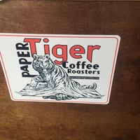 Photo taken at Paper Tiger Coffee Roasters by Michael P. on 1/2/2018