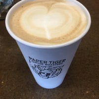 Photo taken at Paper Tiger Coffee Roasters by Michael P. on 12/16/2016