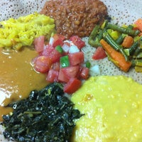 Photo taken at Mahider Ethiopian Restaurant and Market by DinkyShop S. on 1/17/2013