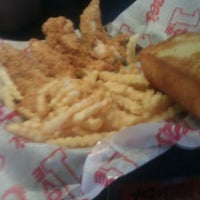 Photo taken at Raising Cane&#39;s Chicken Fingers by Angie M. on 3/1/2013
