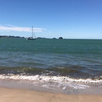 Photo taken at Cooks Beach by Alicia G. on 3/15/2017