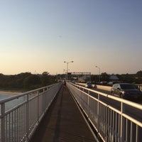 Photo taken at Marine Parkway - Gil Hodges Memorial Bridge by Eugene K. on 7/11/2015