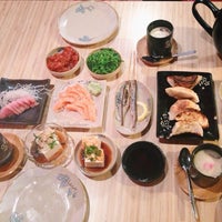 Photo taken at Kuru Kuru Japanese Restaurant by Angelina L. on 6/14/2014