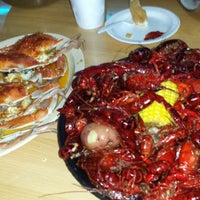 Photo taken at New LA Crawfish Boil Restaurant by Michael P. on 8/3/2013