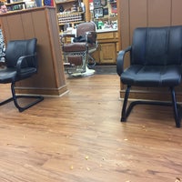 Photo taken at John&amp;#39;s Barber Shop by Brian O. on 10/28/2016
