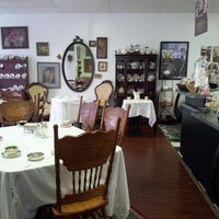 Photo taken at Just Delicious Scones &amp;amp; The Royal Treat Tea Room by John P. on 1/31/2013