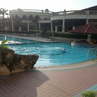 Photo taken at Swimming Pool @ Tanjung Puteri Resort by Arip on 1/17/2013