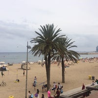 Photo taken at Barceloneta Beach by Atakan O. on 8/15/2017
