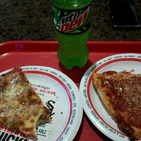 Photo taken at Beggars Pizza by Joe S. on 3/1/2017