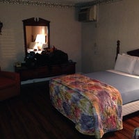 Photo taken at Alamo Inn &amp;amp; Suites by Jess H. on 12/17/2013