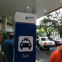 Photo taken at Taxi Stand NUH by Esther A. on 12/31/2012